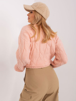 Hurtownia Brzoskwiniowy dzianinowy sweter w warkocze