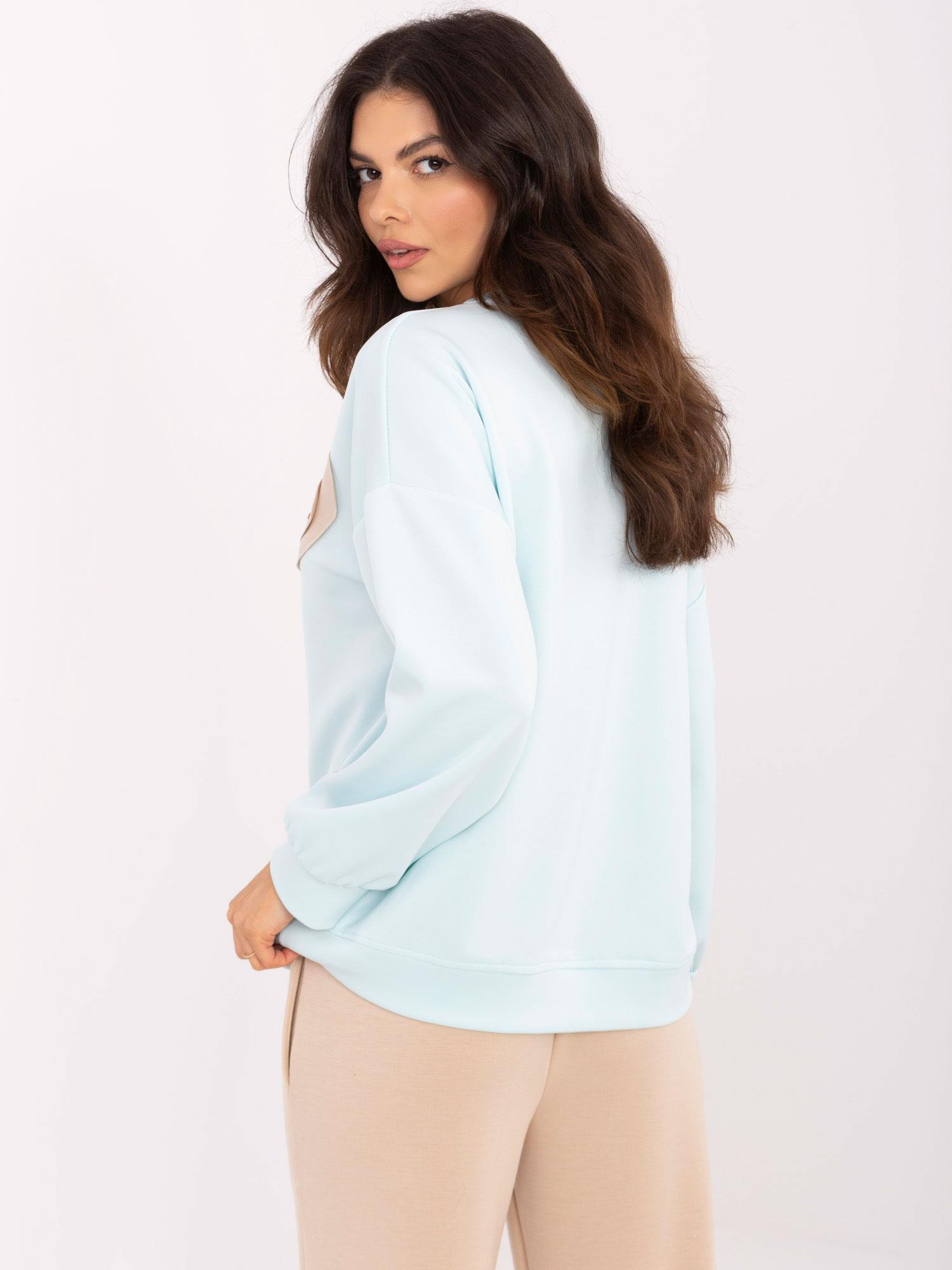 Hurtownia Jasnoniebieska bluza oversize bez kaptura