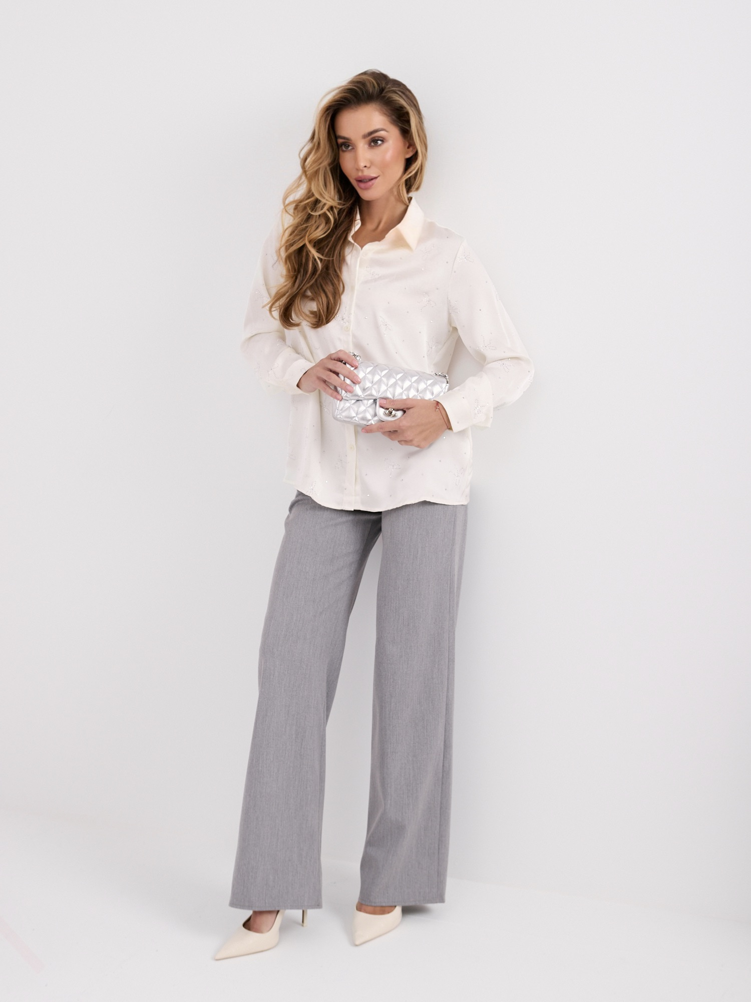 Ecru dress shirt with bowtie studs.