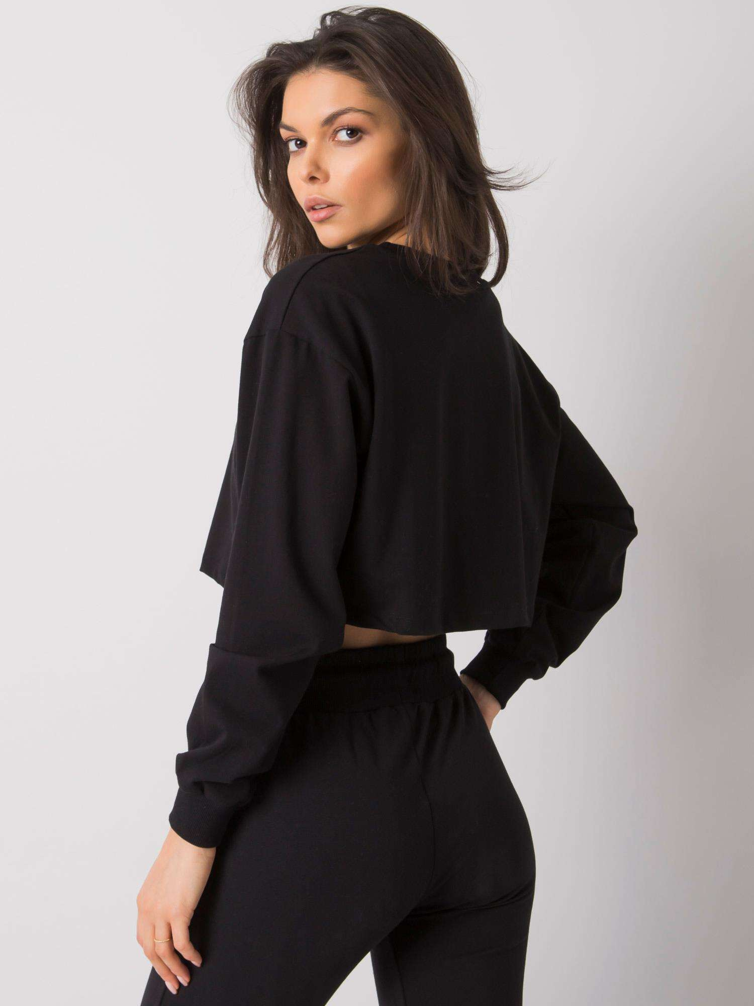 Black short basic top by Simeon.