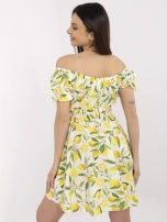 Ecru-yellow off-the-shoulder dress with lemons.