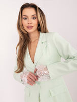 Miętowa marynarka jednorzędowa marynarka z koronką