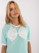 Hurtownia Miętowa elegancka bluzka z kokardą