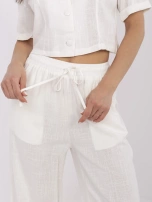Ecru letnie spodnie z szeroką nogawką 