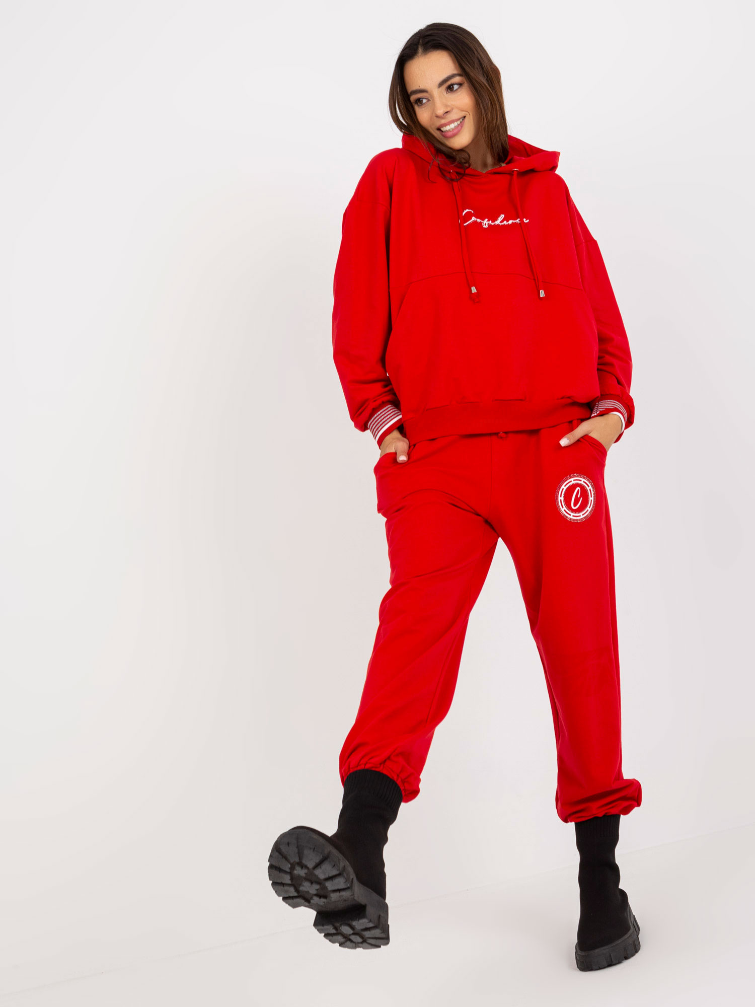 Großhandel Rotes Jogginganzugset mit Kapuzenpullover.