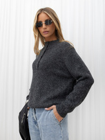 Dark gray fluffy oversized sweater with a collar.