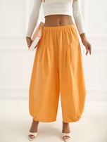 Jasnopomarańczowe sztruksowe spodnie z nogawką 7/8