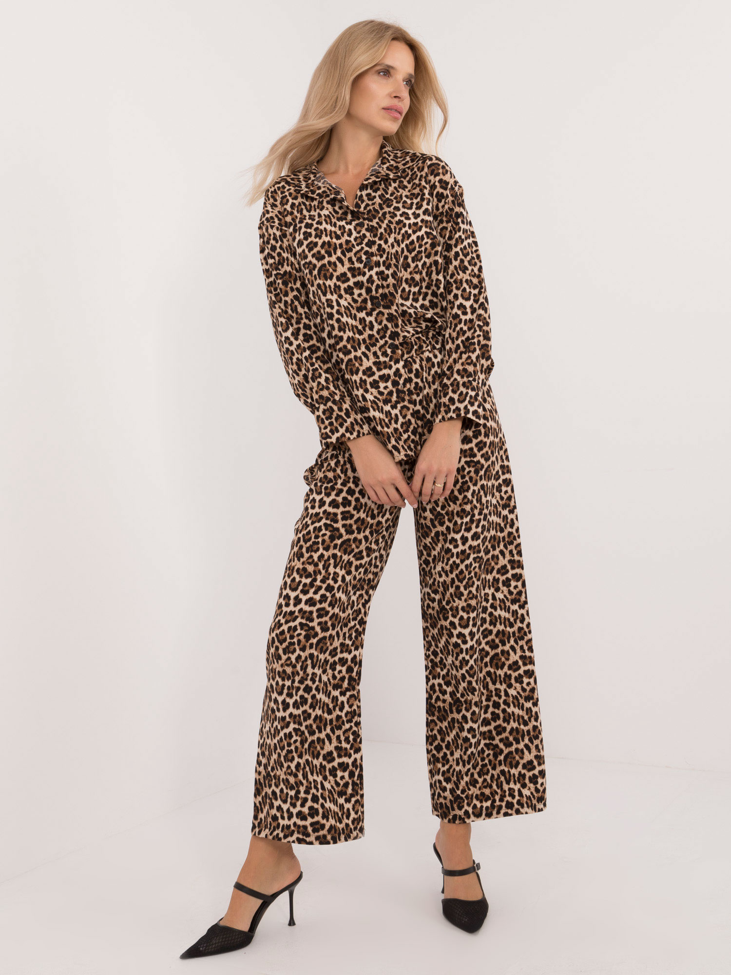 Beige-black two-piece set with leopard print pants.