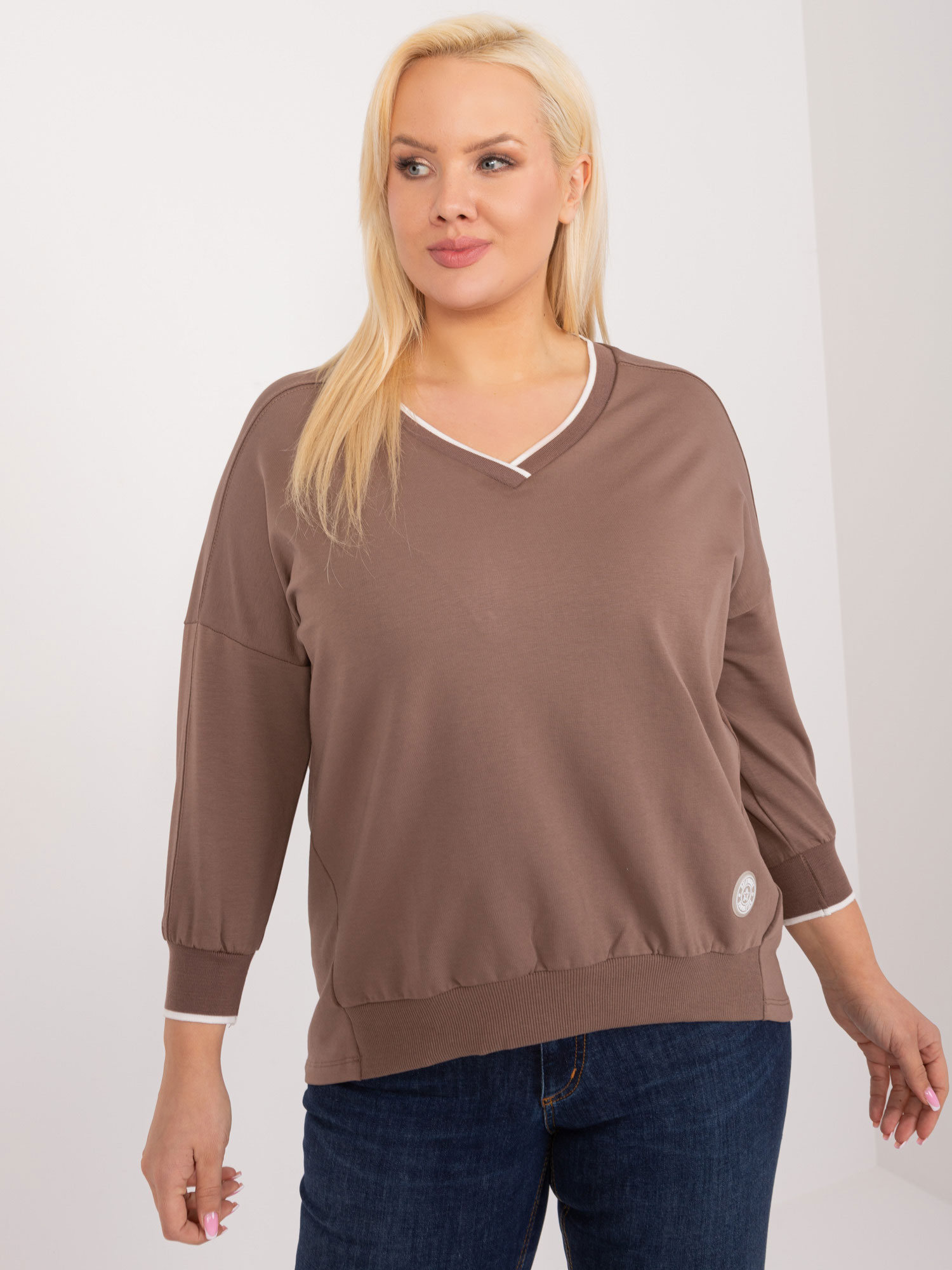 Großhandel Braune Bluse in Übergröße mit Bündchen.