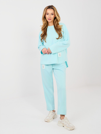 Miętowy komplet z przeszyciami na nogawkach RUE PARIS 