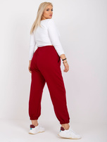 Bordo spalvos plus size sportinės kelnės su kišenėmis Ainhoa.