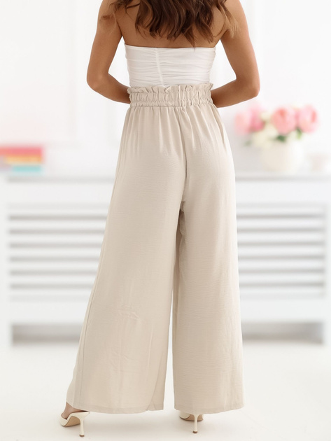 Beżowe szerokie spodnie na lato