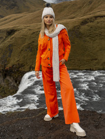 Pomarańczowe spodnie z materiału z szeroką nogawką