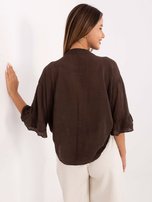 Dark brown flowing shirt with a ruffle.
