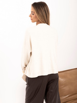 Light beige elegant cardigan with large buttons.