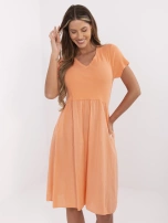 Orange flared summer dress.
