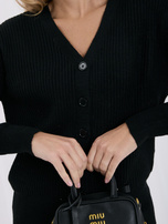Black two-piece set made of ribbed knit.