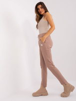 Hurt Ciemnobeżowe spodnie dresowe z troczkami