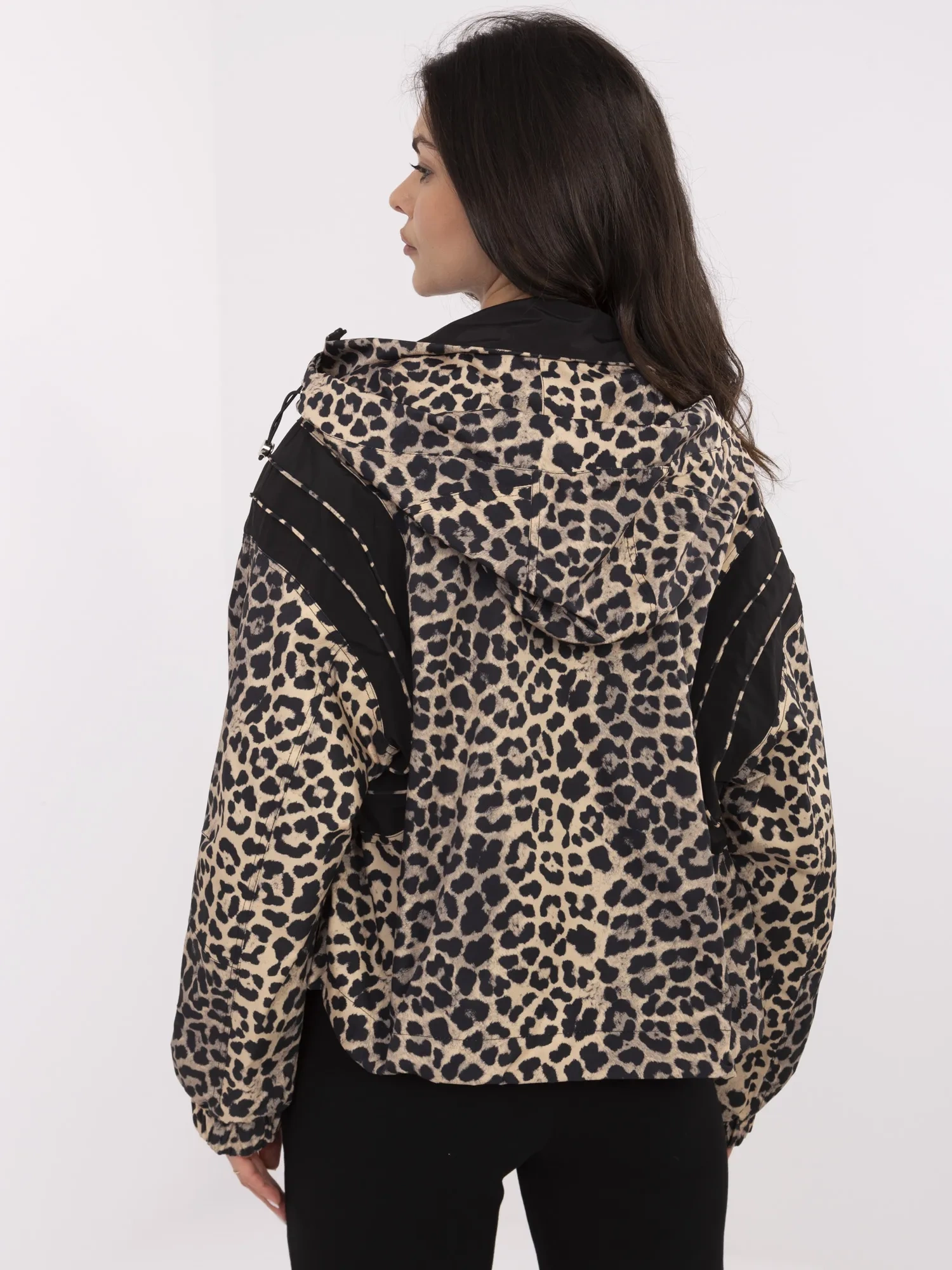 Black-camel windbreaker jacket with print.