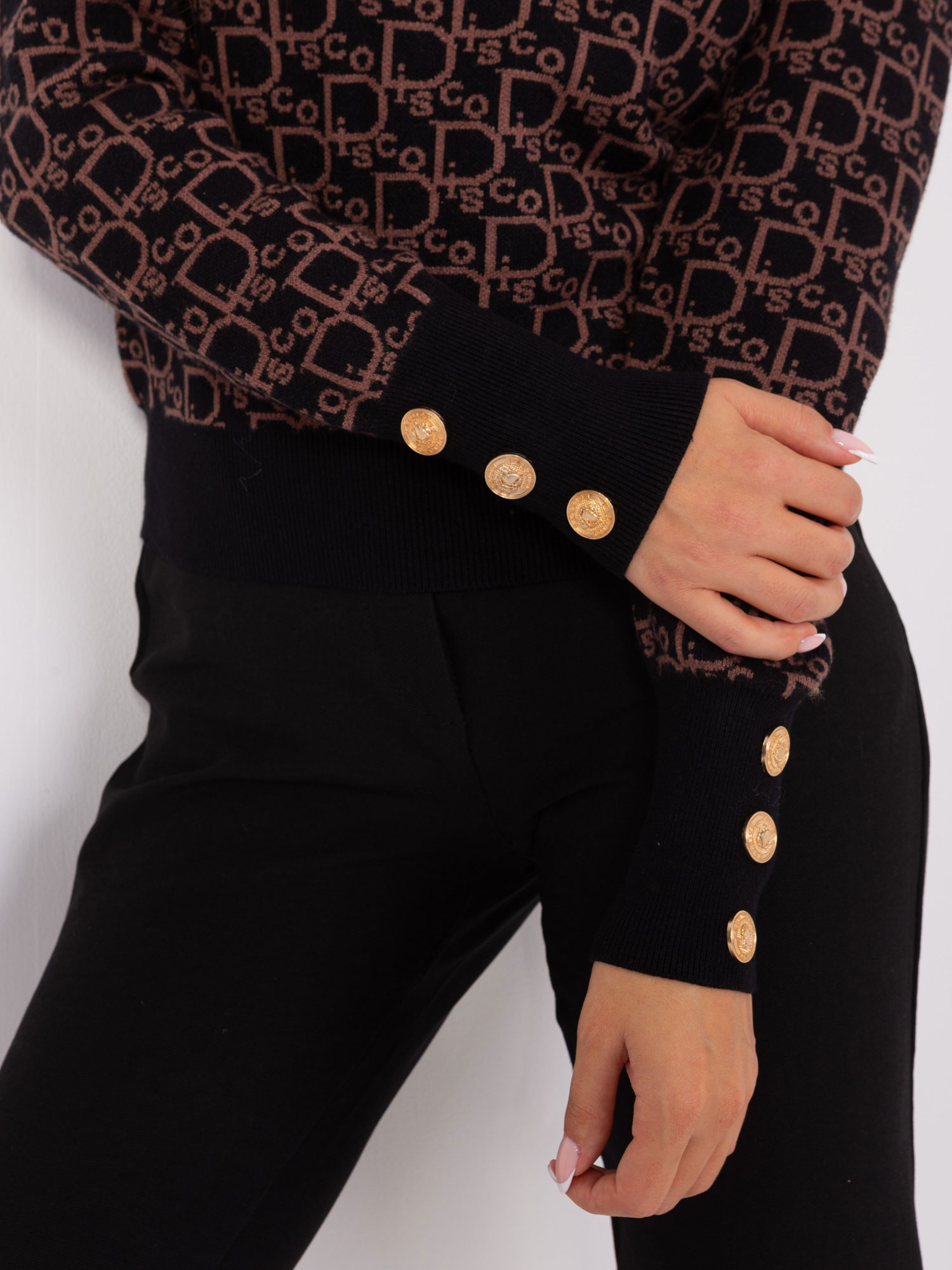 Black and brown classic sweater with a pattern