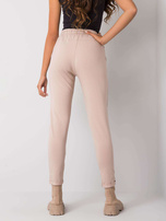 Beżowe spodnie dresowe z napisami Haylee