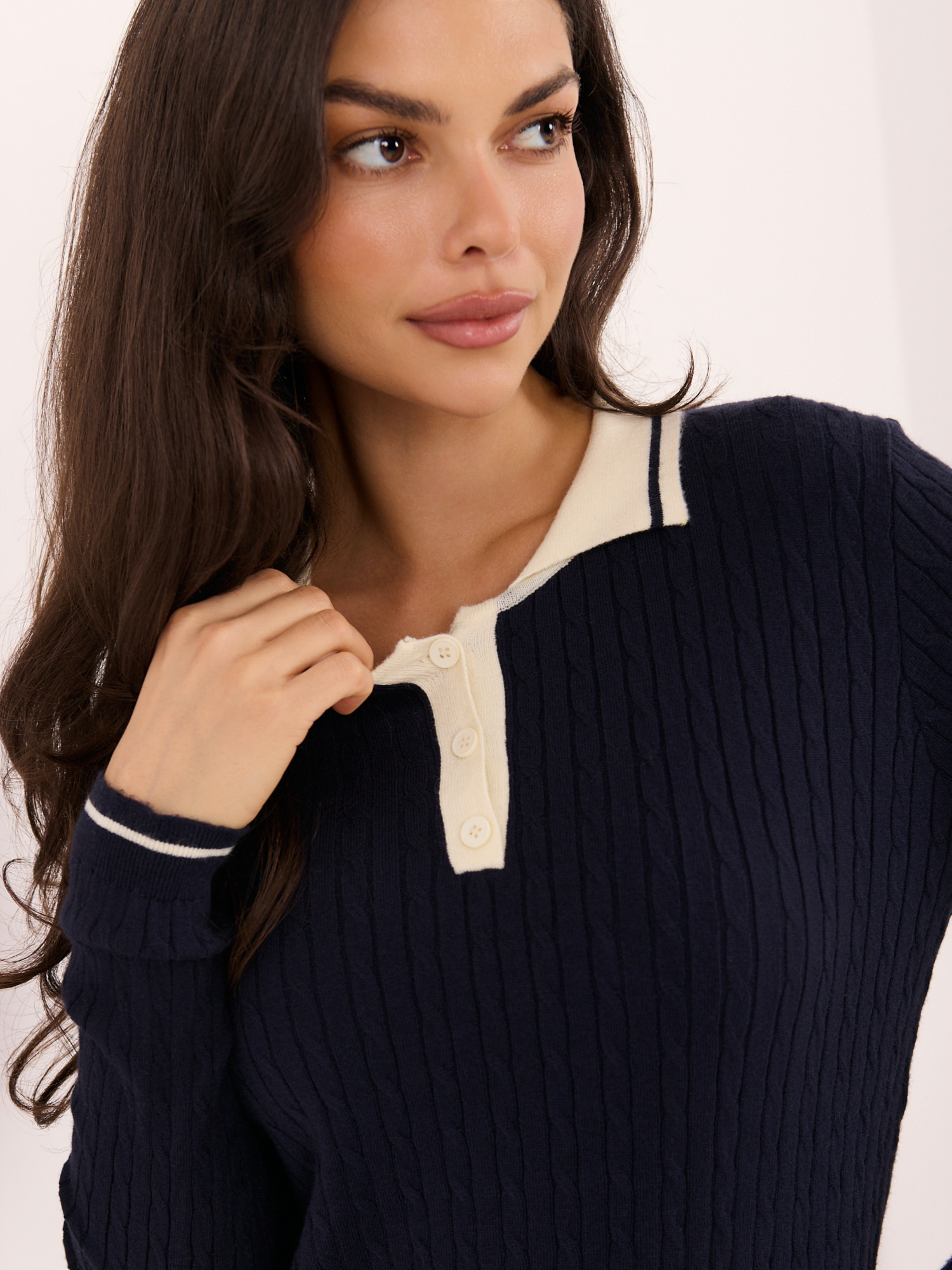 Navy women's sweater with a contrasting collar.