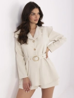 Jasnobeżowy garniturowy kombinezon damski z paskiem 