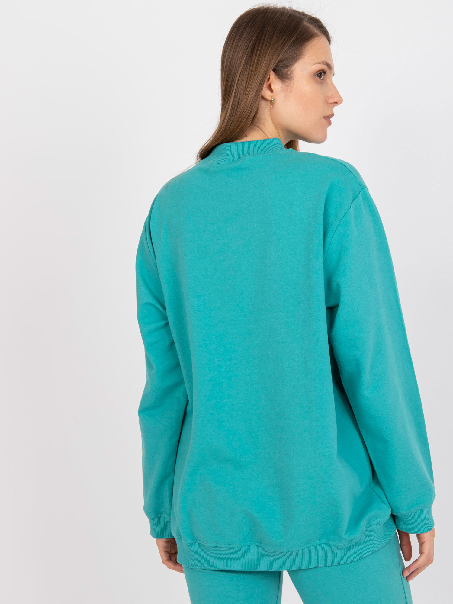 Turquoise basic sweatshirt in an oversized fit.