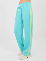 Turkusowy dresowy komplet z kontrastowymi lampasami RUE PARIS 