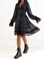 Black flared dress with leopard print.