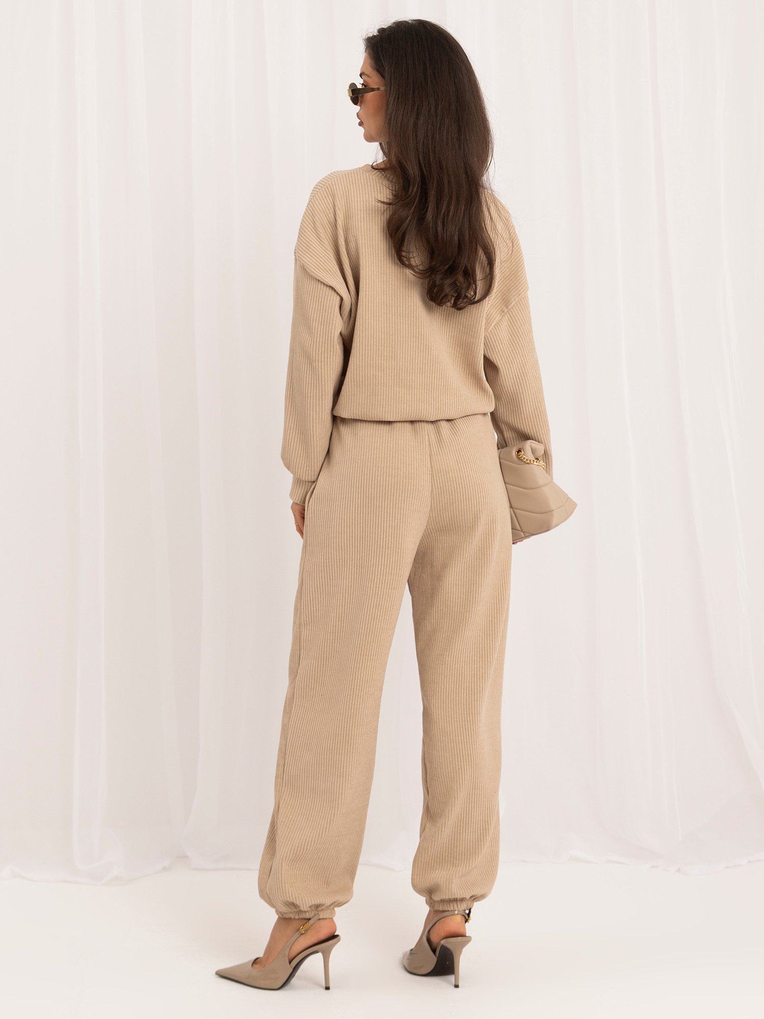 Beige corduroy set with cuffs.