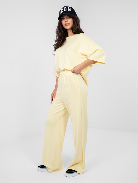 Pastelowe żółte spodnie wide leg z wysokim stanem RUE PARIS
