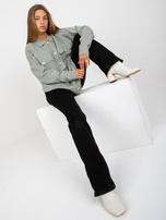 Hurtownia Jasnozielony sweter rozpinany o kroju koszuli 