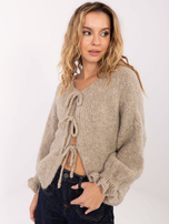 Beżowy kardigan z falbankami przy rękawach