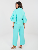 Turkusowe jeansy wide leg bez zapięcia