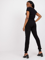 Czarne spodnie dresowe damskie slim fit z dżetami