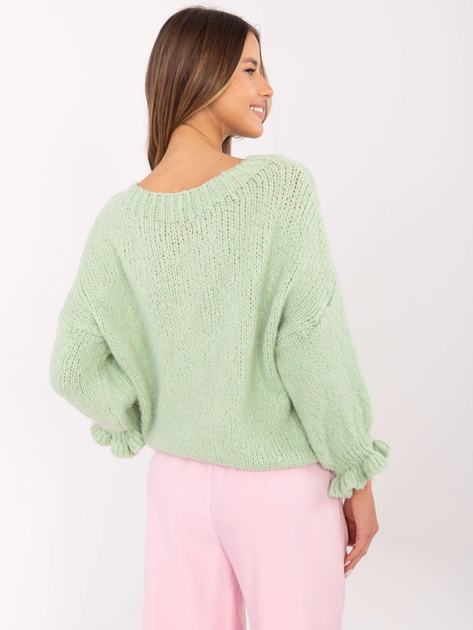 Hurtownia Pistacjowy sweter falbankami przy rękawach
