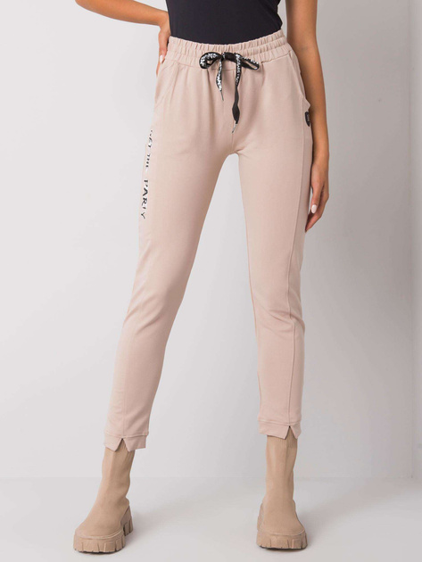 Beżowe spodnie dresowe z napisami Peyton