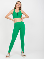 Grüne Basic-Leggings mit Fußband.
