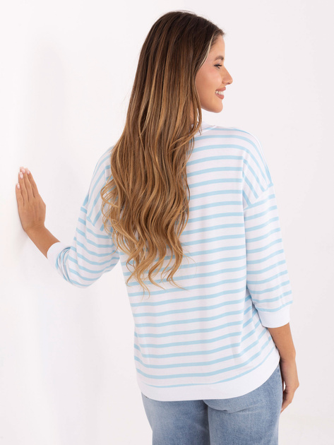 Biało-jasnoniebieska bluzka oversize z naszywką