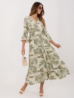 Green summer dress with patterns.
