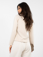 Jasnobeżowa dresowa marynarka z imitacją kieszeni