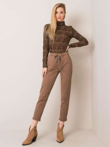 Carrie's dark beige pants