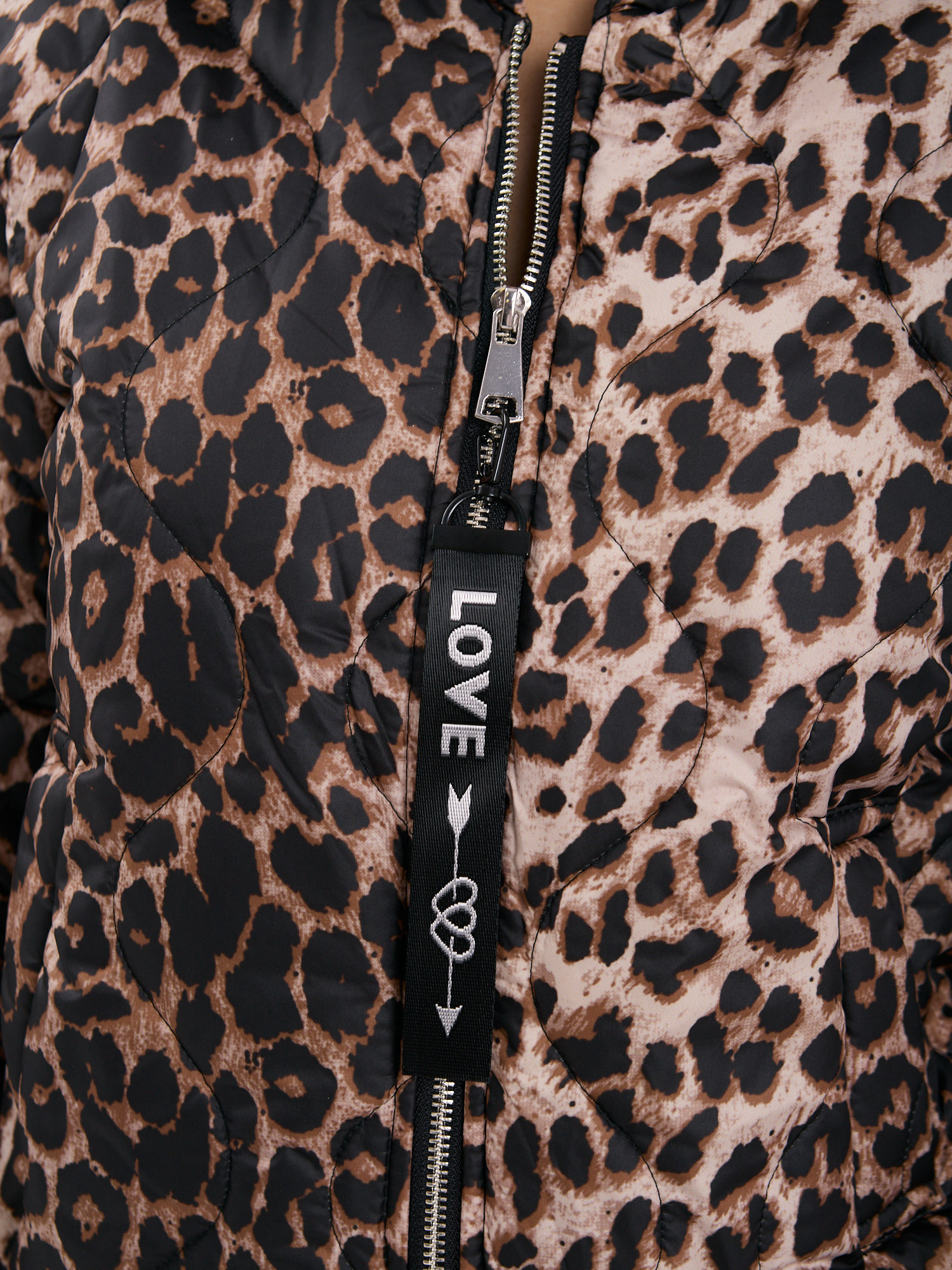 Black-camel bomber jacket with animal print.