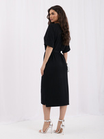 Black simple dress made of knit fabric.