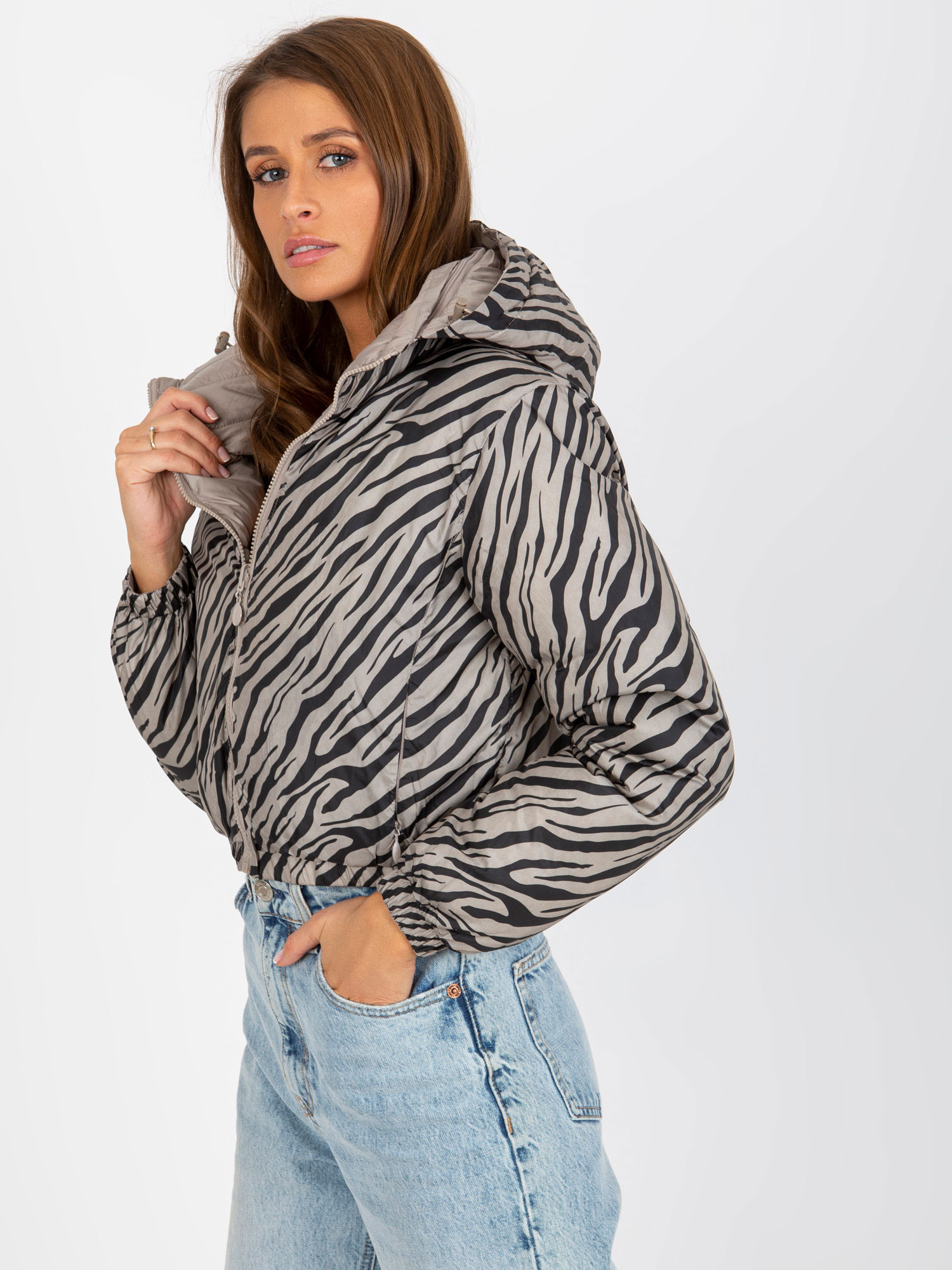 Hurt Dunkelbeige beidseitig gepolsterte Jacke im Tiermuster.