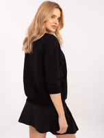 Hurtownia Czarna bawełniana bluzka z perełkami