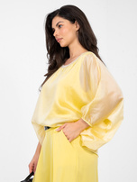 Żółta elegancka bluzka o kroju nietoperza 