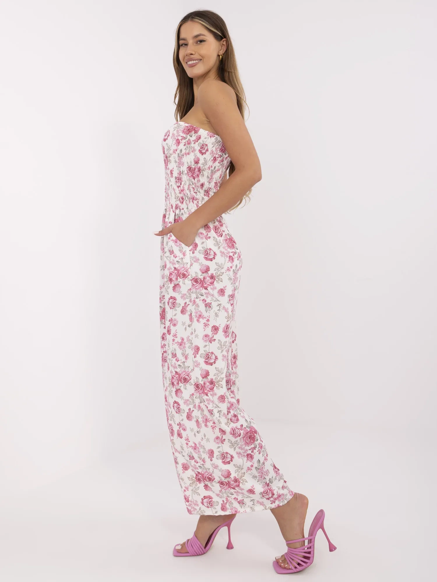 Ecru-pink long jumpsuit with flowers.