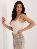 Jasnobeżowy krótki top z koronką 